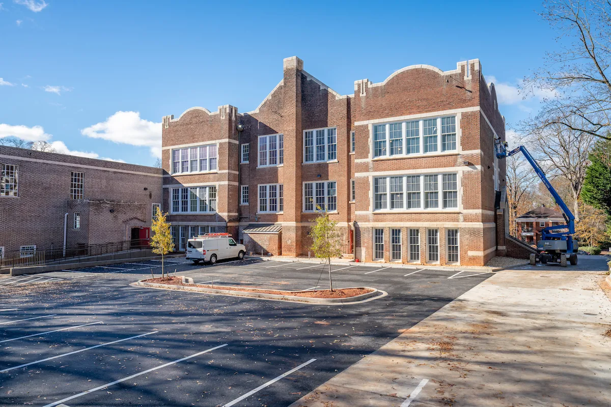 Brick exterior of the former Adair Elementary School, converted into Academy Lofts