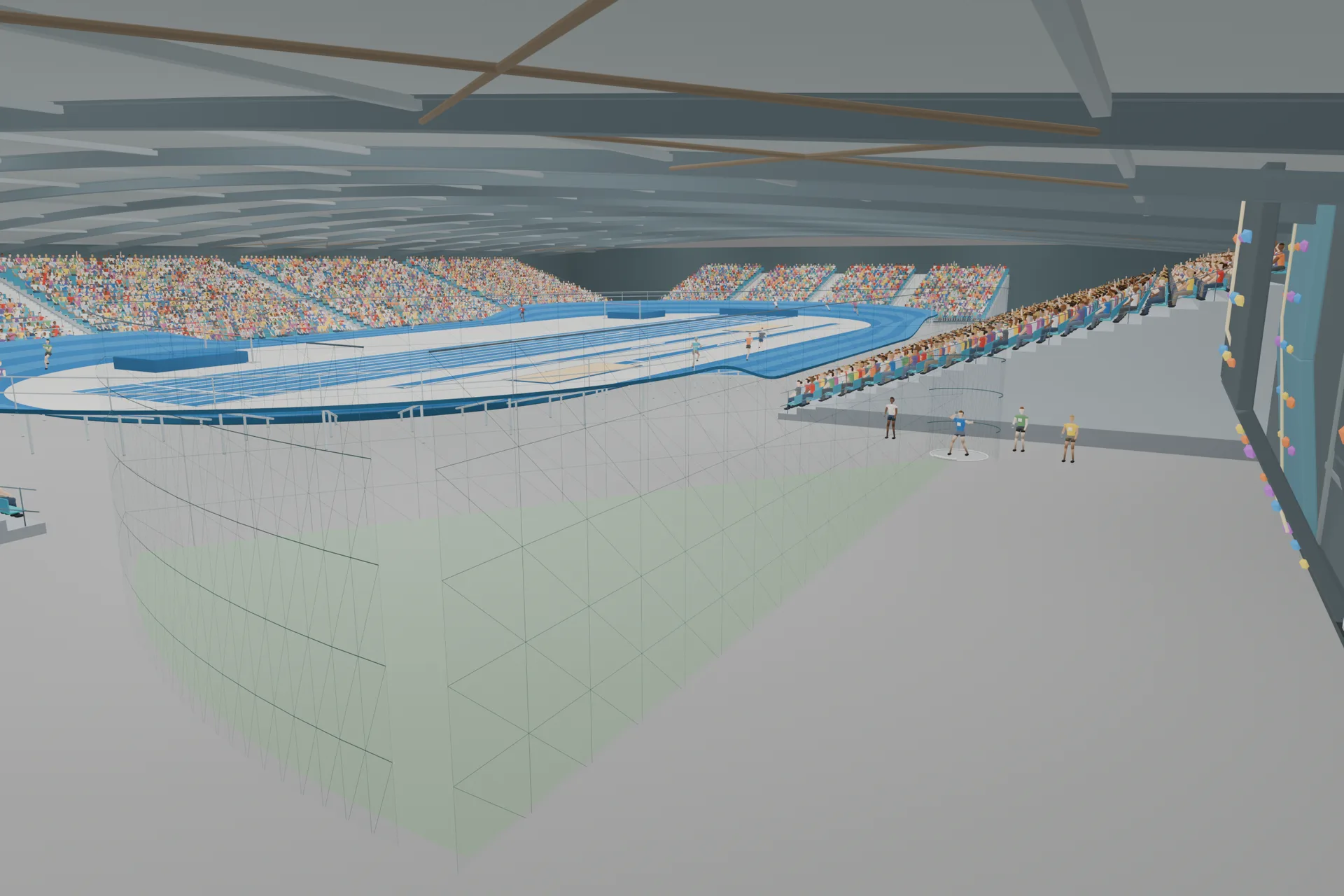 Interior view of the netted throwing area beside the indoor track during a competition