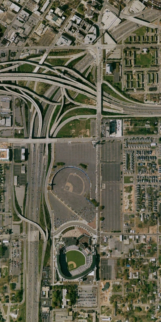 Satellite image of Turner Field surrounded by highways and surface parking in 2002